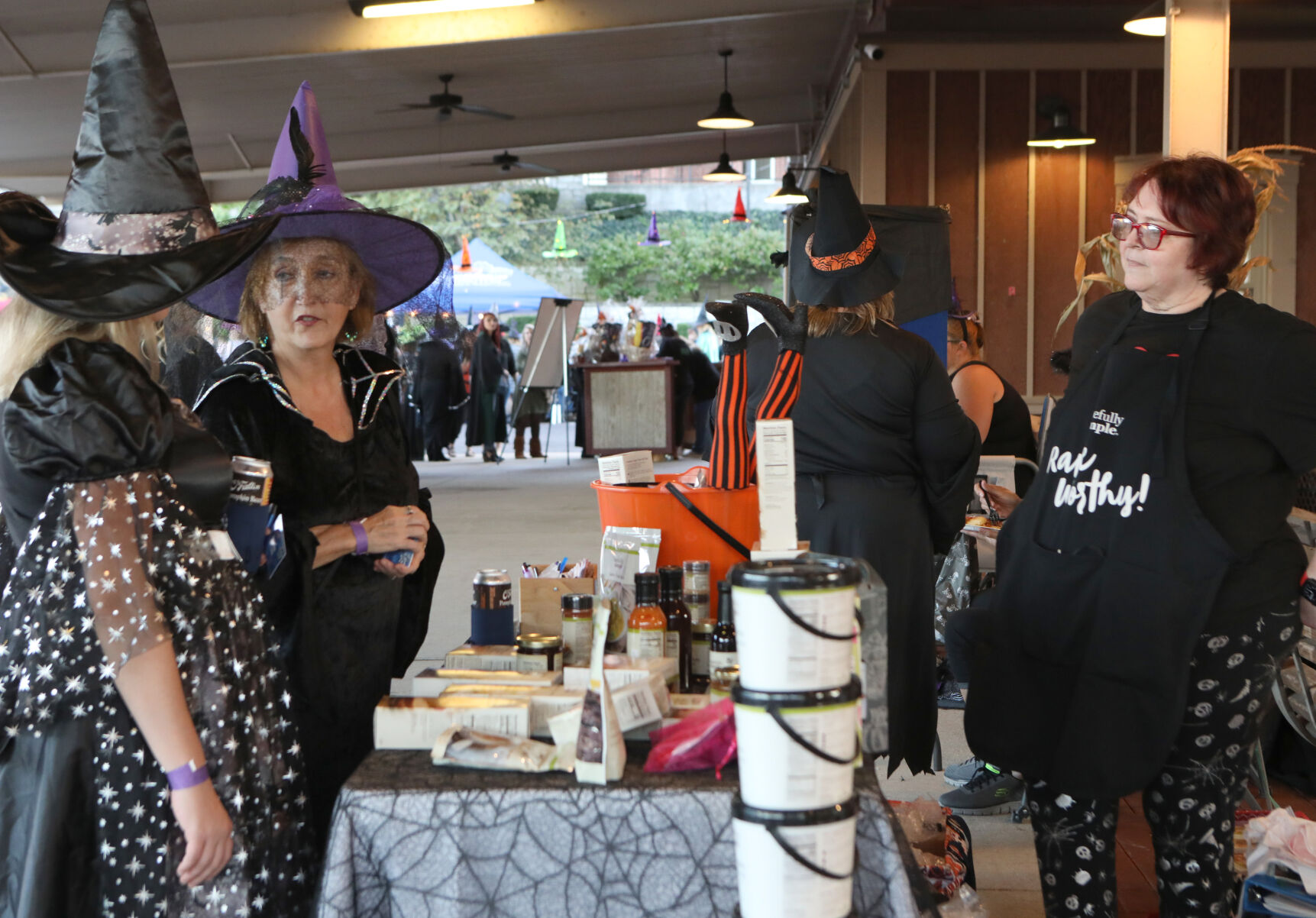 Debra Bliss and Sara Frick visit Nickie Alfermann's booth